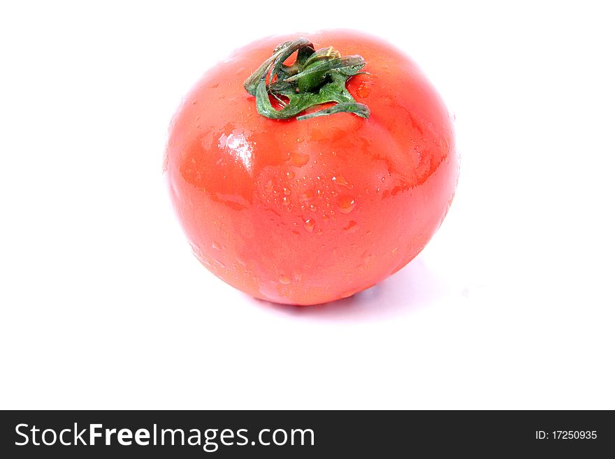 Juicy red tomatoes isolated on white background