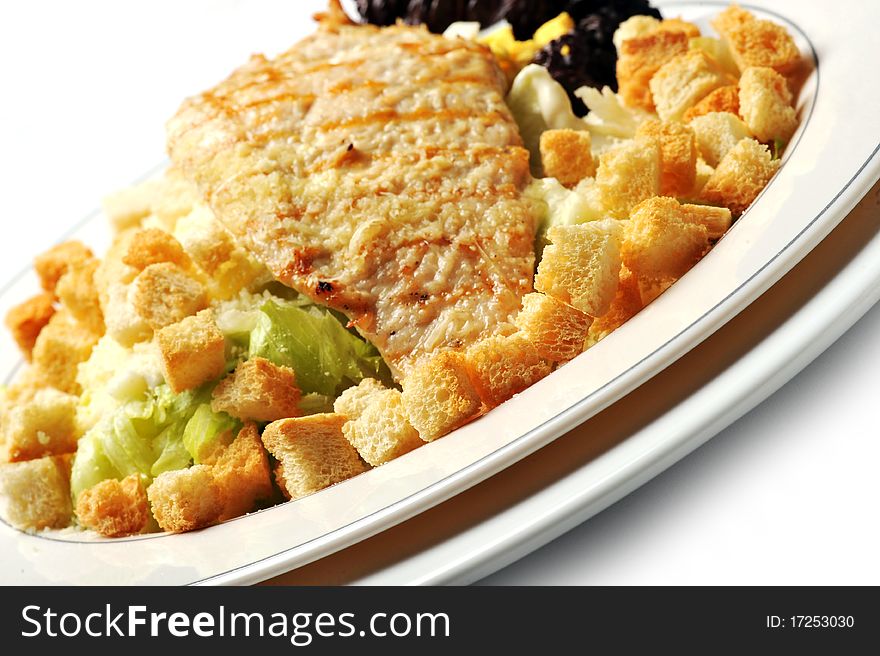 Fried chicken fillet with cheese and vegetables. salad