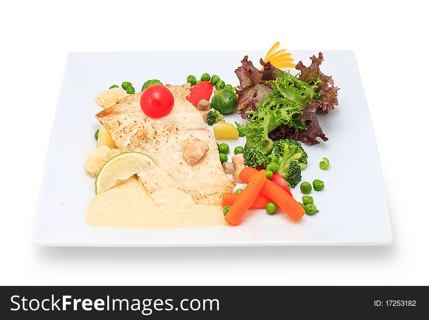 Seafood with vegetables and herbs on a ceramic platter. Seafood with vegetables and herbs on a ceramic platter