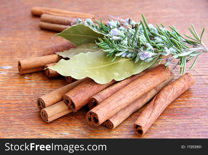 Macro view of the different spices on wooden background