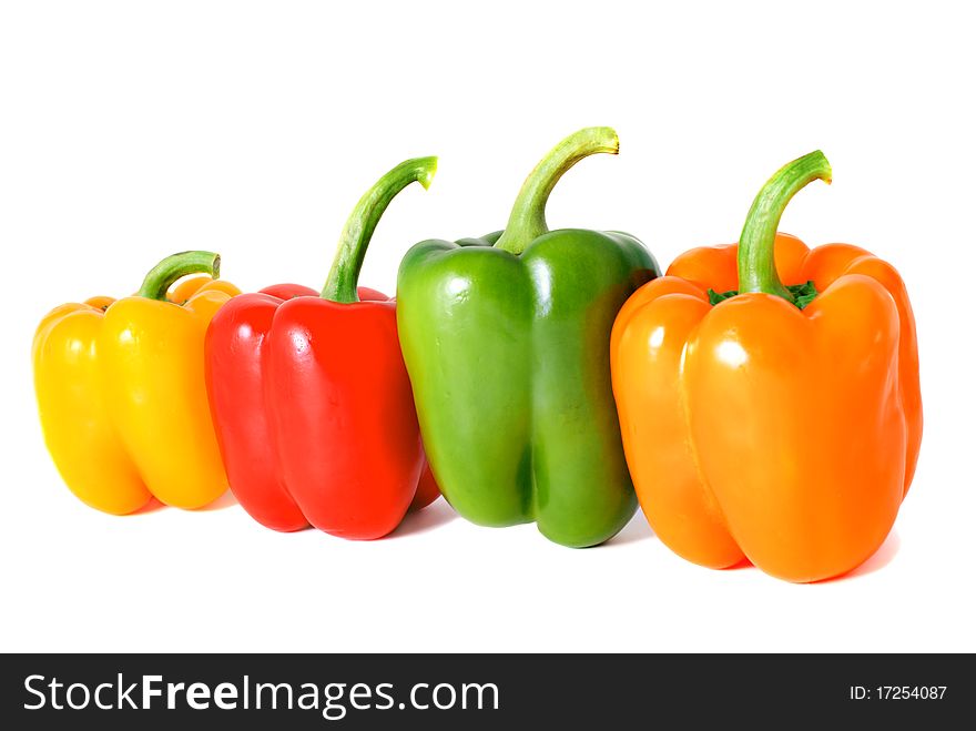Four sweet peppers on a white background. Four sweet peppers on a white background
