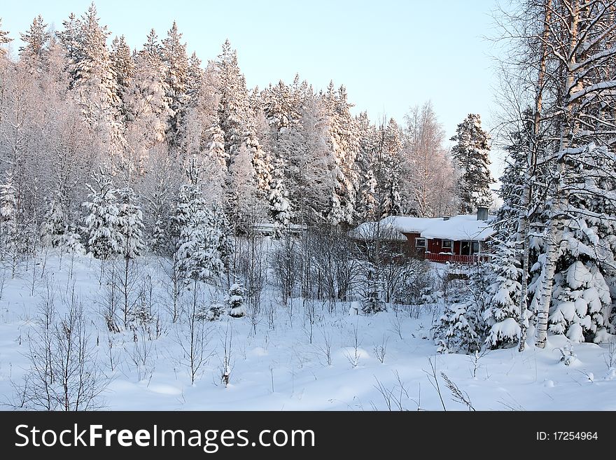 Wooden cottage in the winter. Finland. Wooden cottage in the winter. Finland.