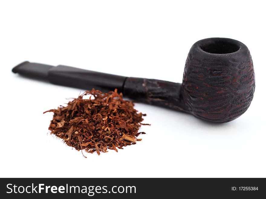 Old pipe tobacco on a white background