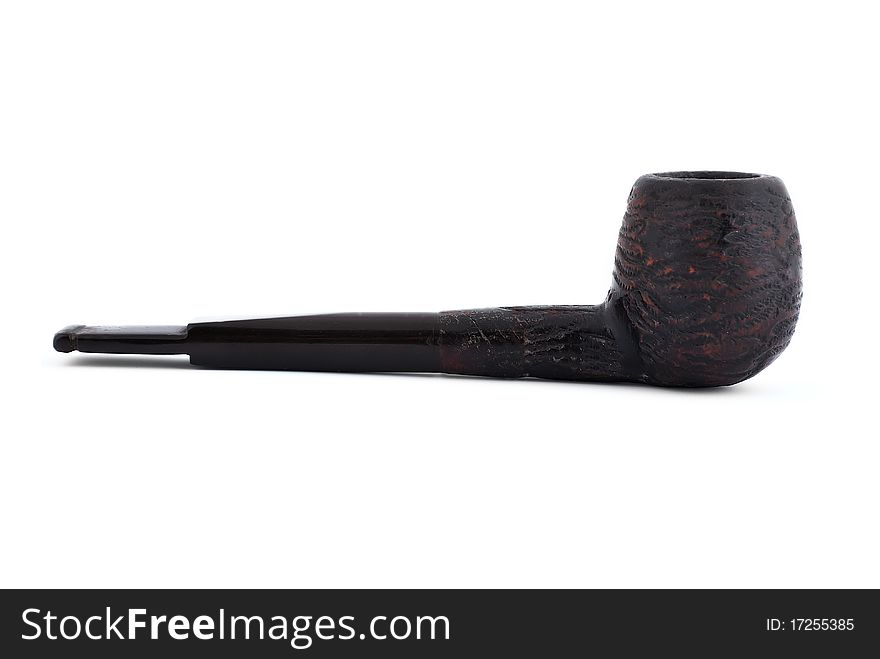 Old pipe tobacco on a white background