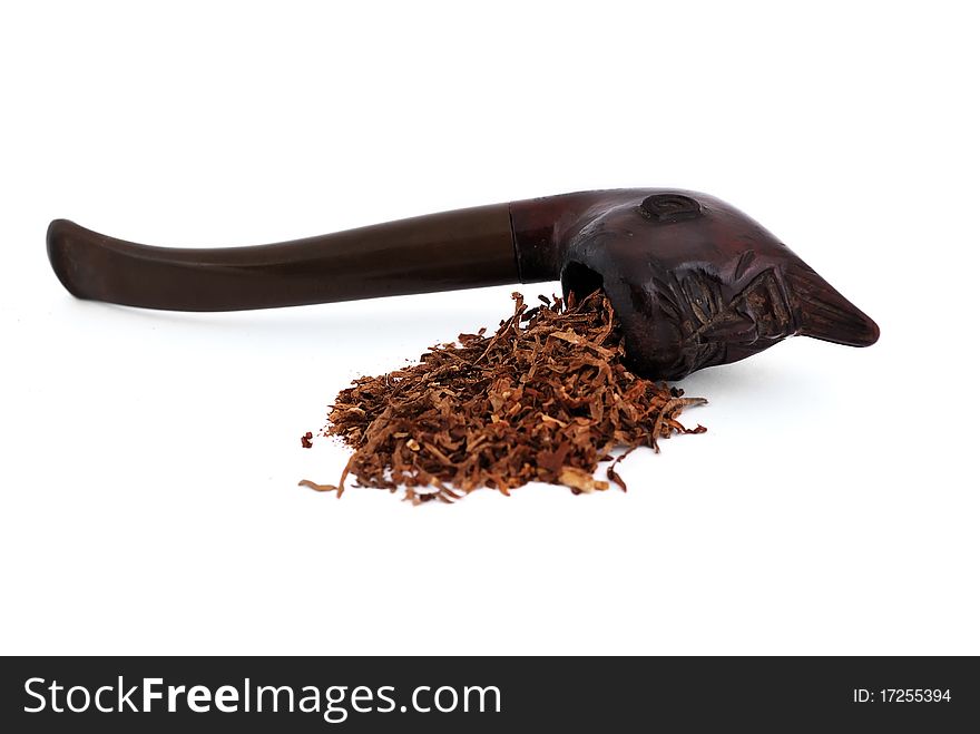 Old pipe tobacco on a white background