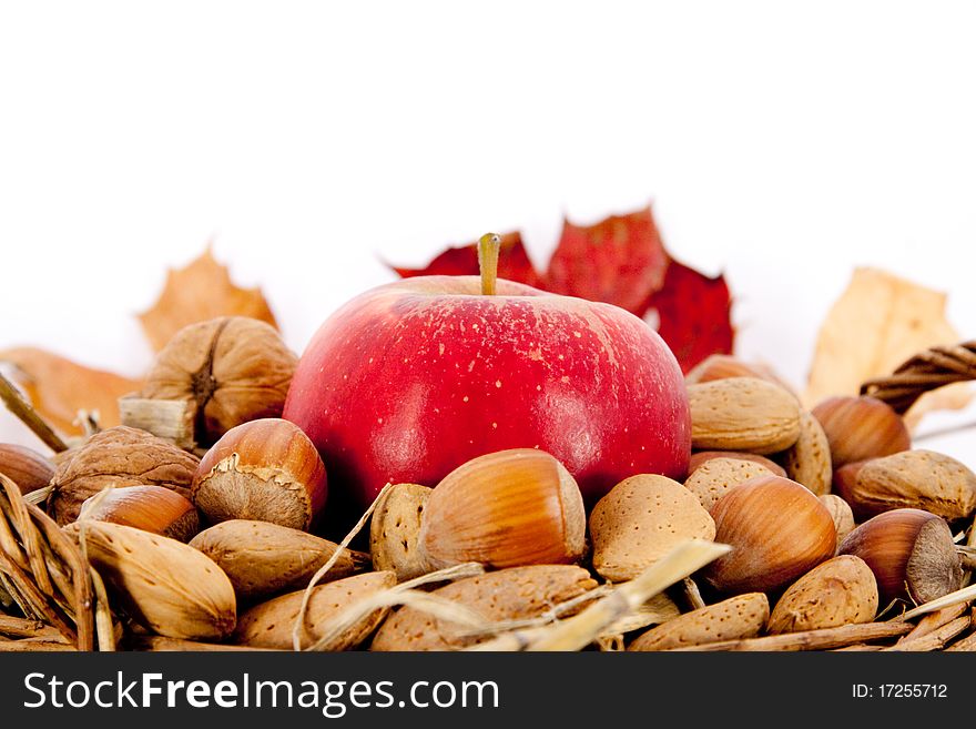 Nuts And Appel In A Basket