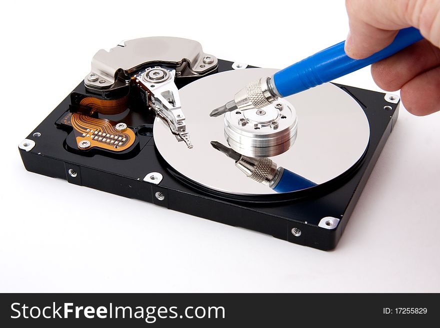 Open hard-drive with screw-driver