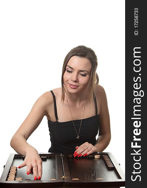 Young woman play the backgammon. Young woman play the backgammon