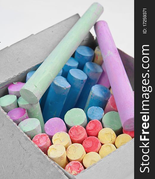 Colored chalks in a box