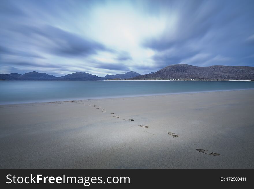 Foot Prints On The Sandy Beach