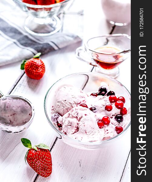 Organic Homemade Ice Cream In Glass Bowl On Wooden Background