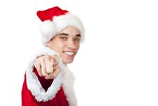 Teenager Dressed As Santa Claus Points With Finger Stock Photo