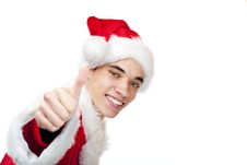 Smiling Male Santa Claus Teenager Shows Thumb Up Stock Images