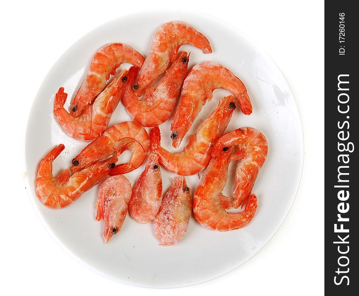 Plate frozen prawns insulated on white background