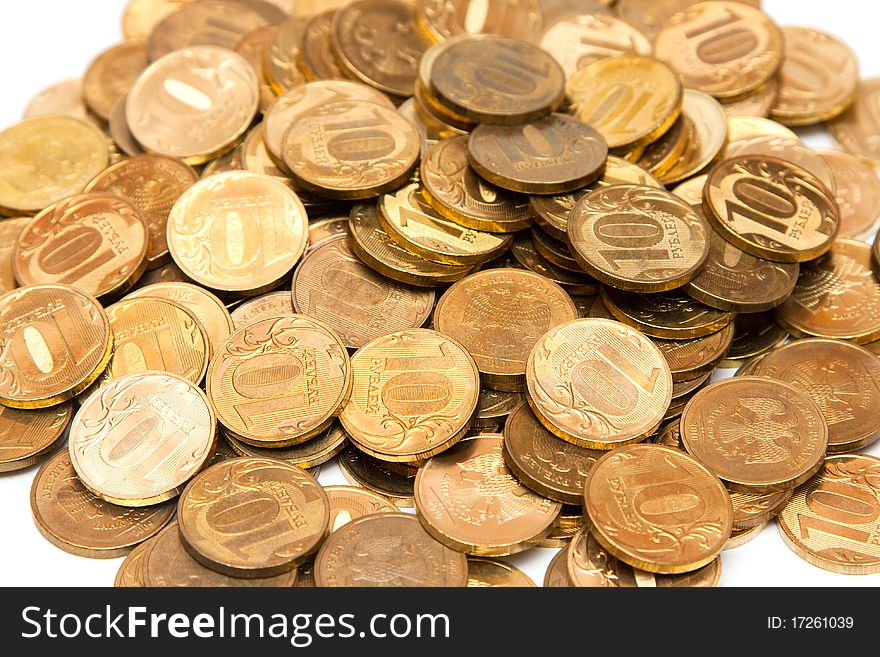 Pile full of golden  coins of ten roubles. Pile full of golden  coins of ten roubles