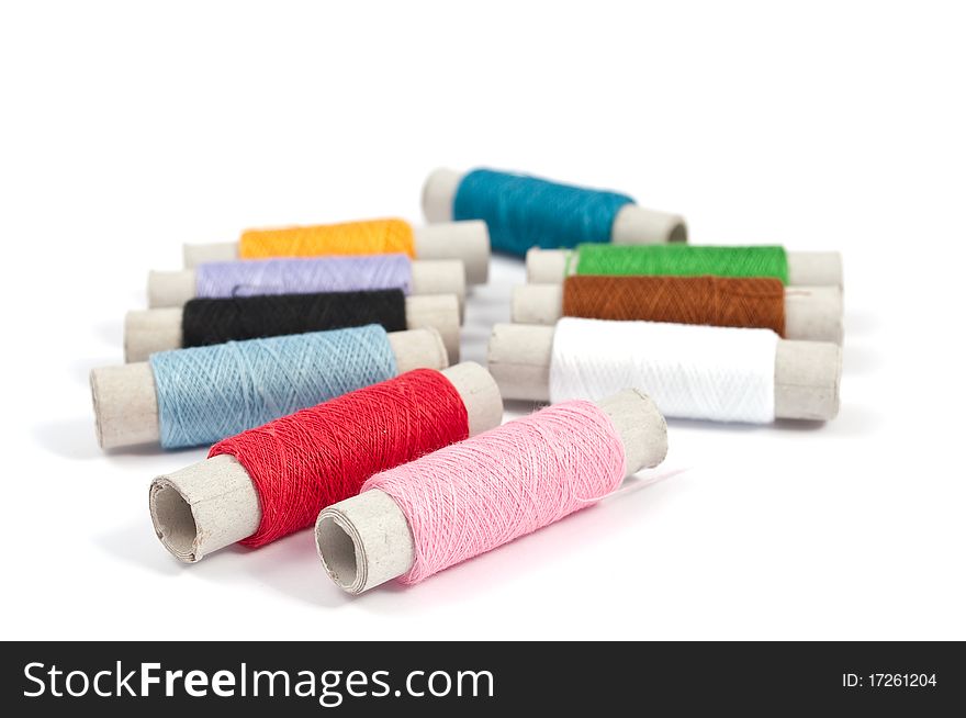 Sewing thread on a white background