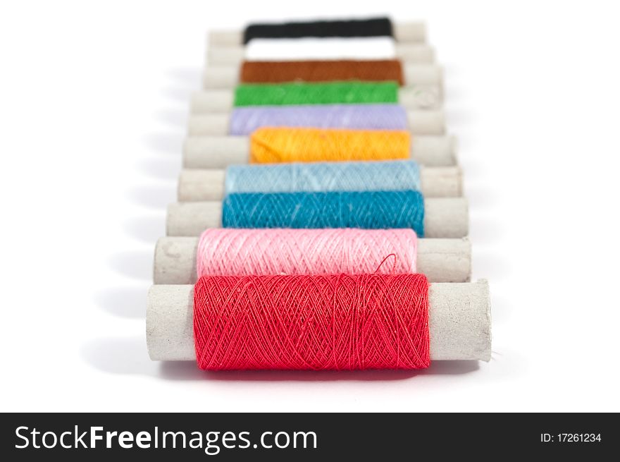 Sewing thread on a white background