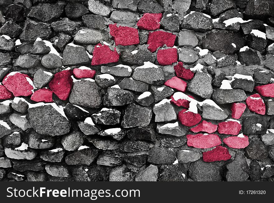 Close up of stone wall with red line and snow. Close up of stone wall with red line and snow