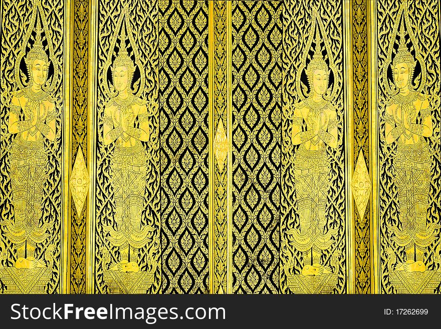 Thai traditional style door painting, coated with real gold plate.