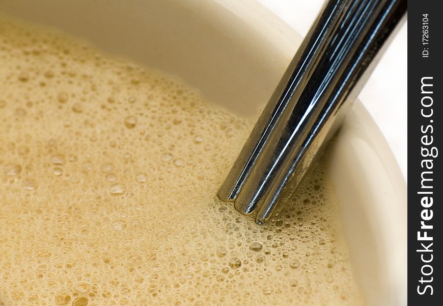 Macroshot Of Coffee And Spoon