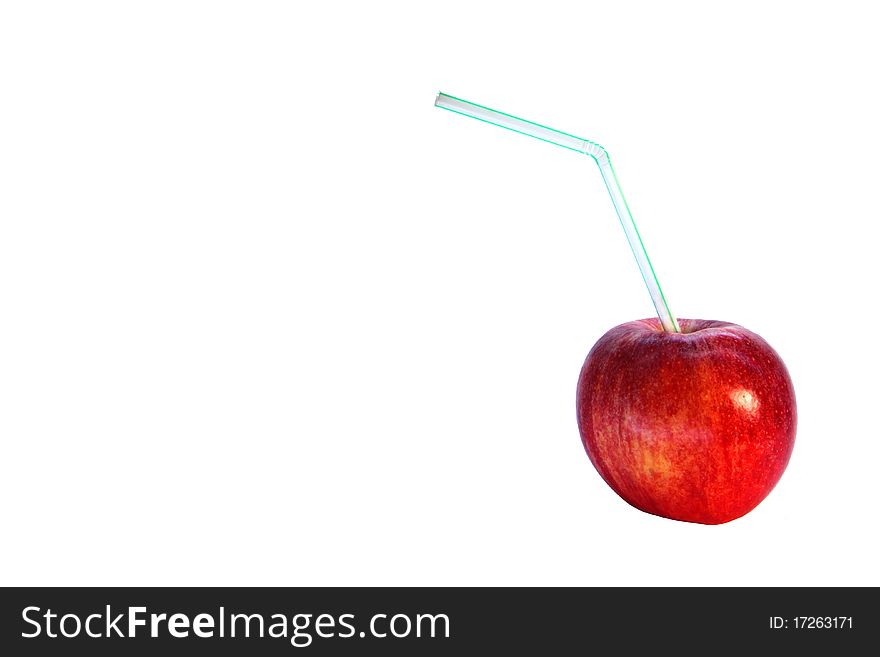 Red apple with a drinking straw. Red apple with a drinking straw