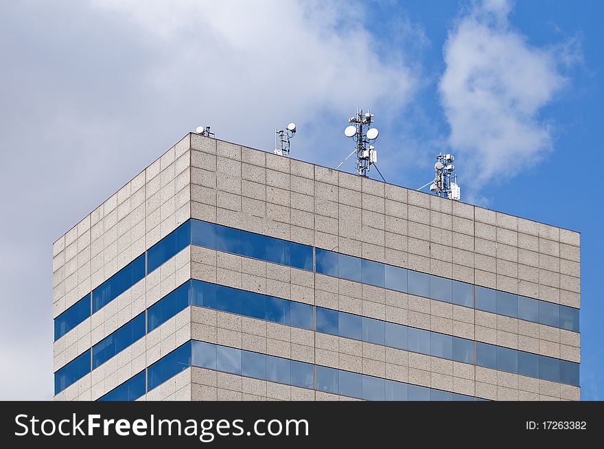 Telecommunication antennas on a rooftop of a modern building at Barcelona, Spain. Telecommunication antennas on a rooftop of a modern building at Barcelona, Spain