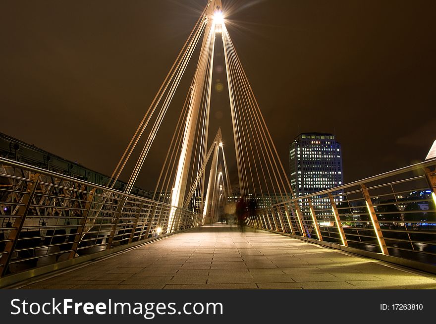 A shot of the Bridge going over the thames, close to the London eye in Westminster. This was taken with a long exposure to creat the blurred affect of the people crossing the bridge. A shot of the Bridge going over the thames, close to the London eye in Westminster. This was taken with a long exposure to creat the blurred affect of the people crossing the bridge.