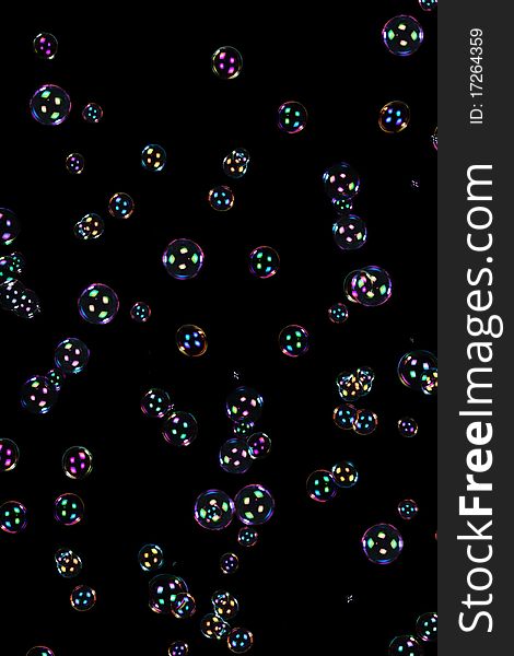 Soap bubbles isolated on black background. Soap bubbles isolated on black background