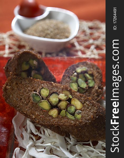 Rolled kibbeh with nuts phistachio vegetable