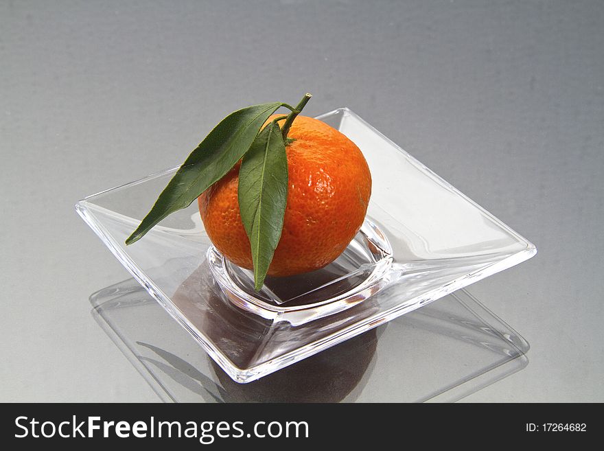Clementine on a plate glass