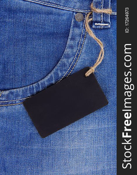 Price tag over jeans textured pocket