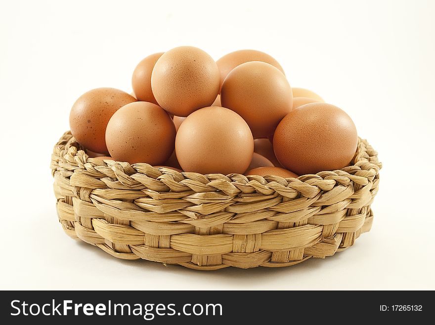 Basket with colored eggs close.up