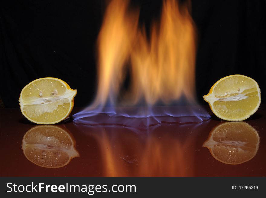 Two pieces of lemon and the fire beween them. Two pieces of lemon and the fire beween them