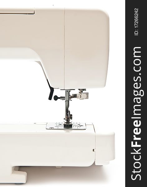 Sewing machine on white background. Details
