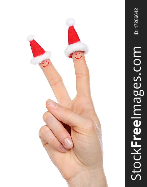 Hand With Small Santas Caps And Smiles