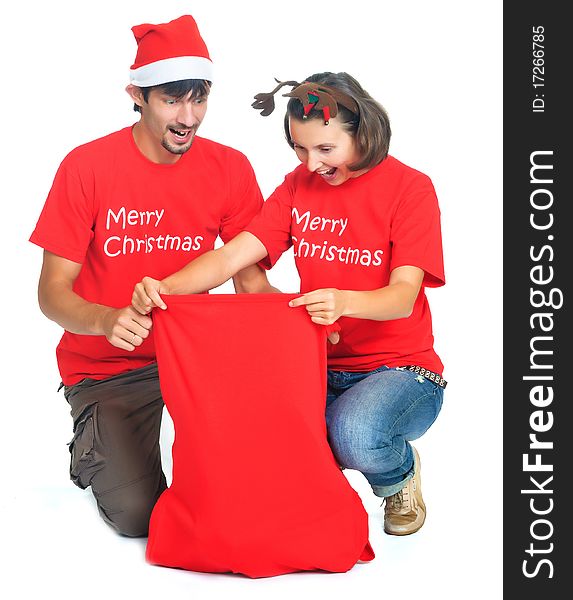 Isolated happy christmas couple with banner