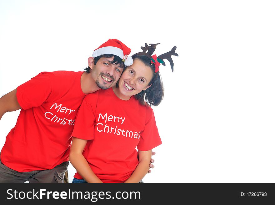 Isolated happy christmas couple in the santa hats. Isolated happy christmas couple in the santa hats