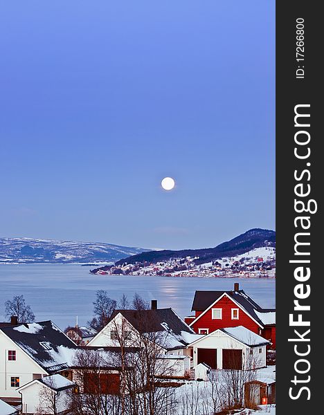 Moon over Finsnes. Norwegian winter landscape. Moon, the polar night.