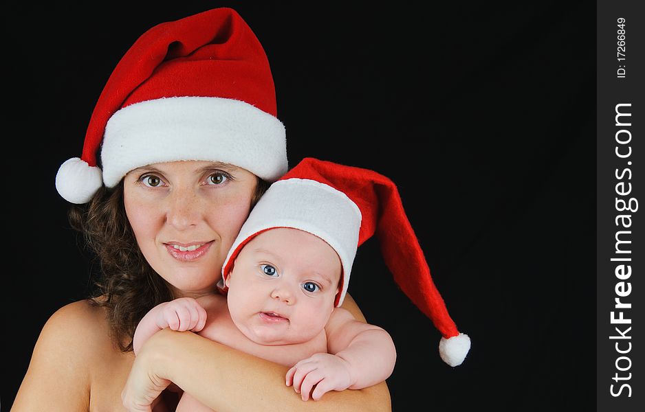 Beautiful Mommy Santa And Her Baby Santa Boy