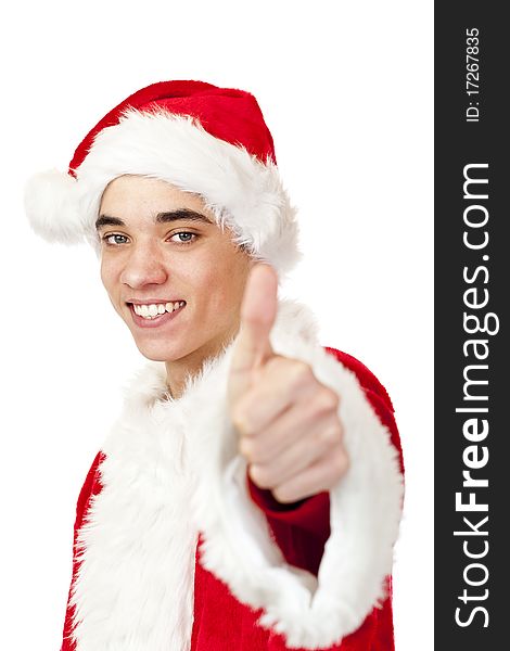 Smiling male santa claus teenager shows thumb up. Isolated on white background.