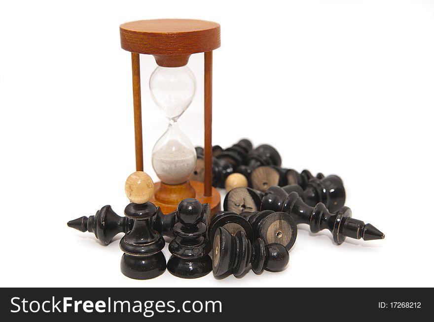 Chess figures and sand-glass on white background. Chess figures and sand-glass on white background