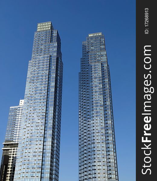 Glass reflecting skyscrapers in Manhattan. Glass reflecting skyscrapers in Manhattan