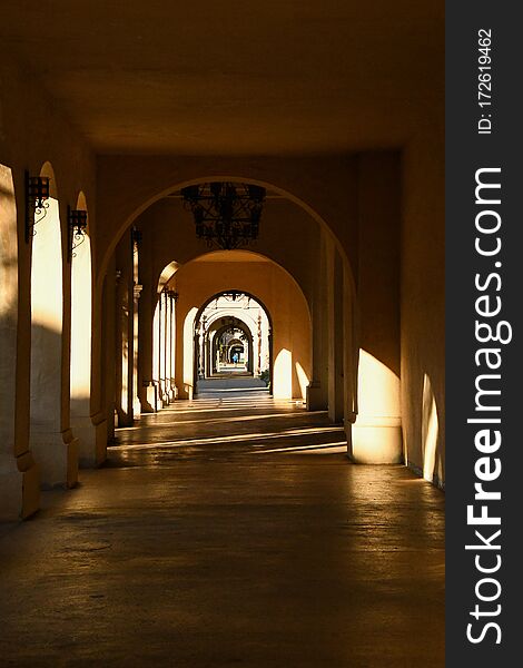 The light plays under the arches of this pathway at Balboa Park in San Diego, CA. The light plays under the arches of this pathway at Balboa Park in San Diego, CA