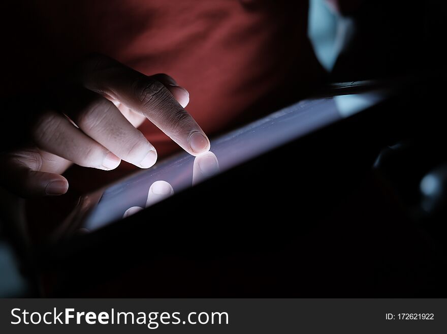 Young Man Use Digital Tablet At Night, Close Up