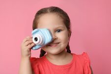 Little Photographer Taking Picture With Toy Camera On Background Royalty Free Stock Photos