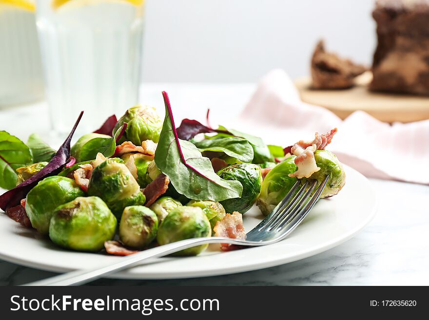 Delicious Brussels Sprouts With Bacon On Table