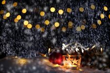 Christmas Theme With Candles, Snow, Pine Cone And Christmas Light Royalty Free Stock Images
