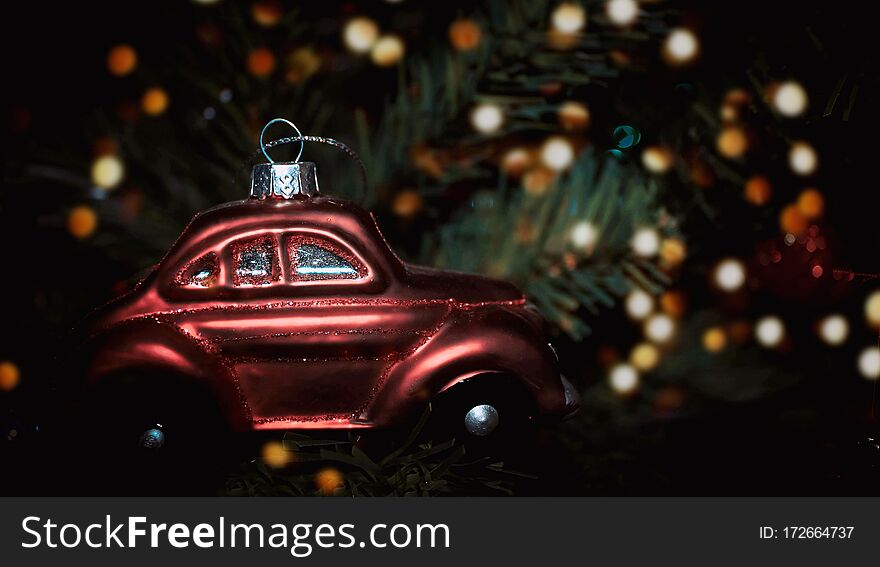 Christmas toy on the Christmas tree. Christmas decorations figurines and other ornaments that decorate a Christmas tree.