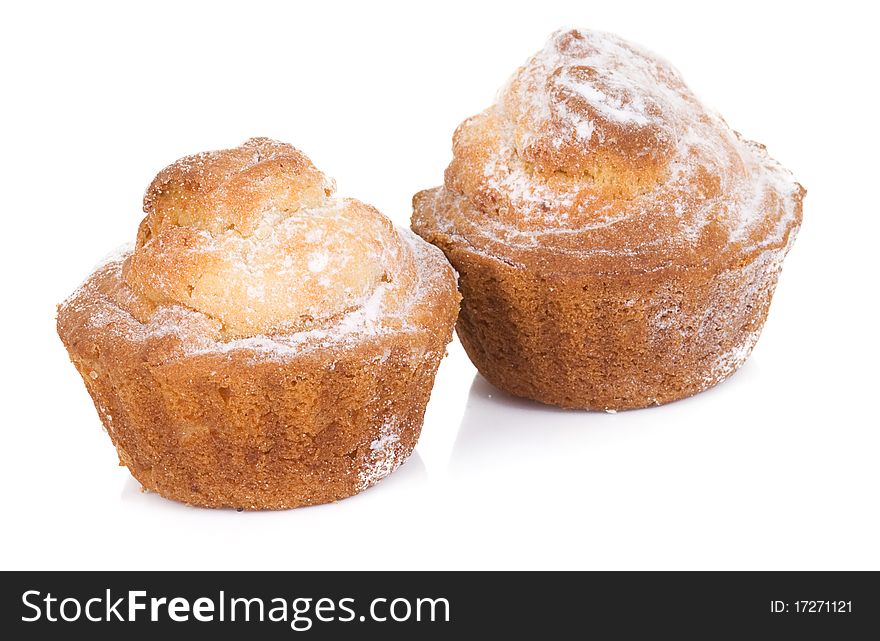 Two muffins isolated on white