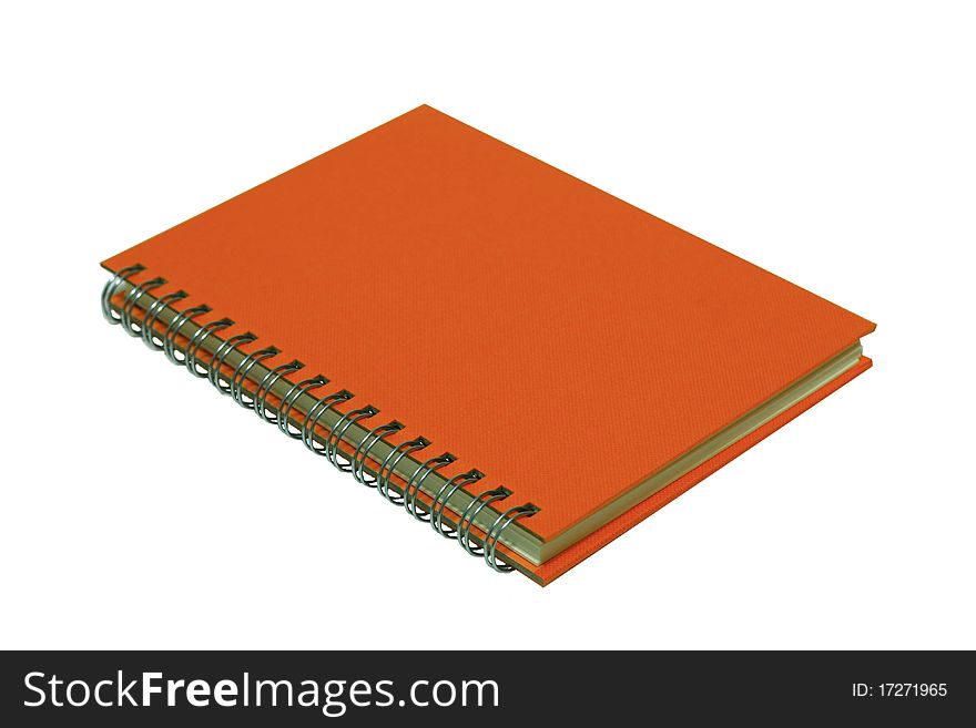 Orange note book on the white background